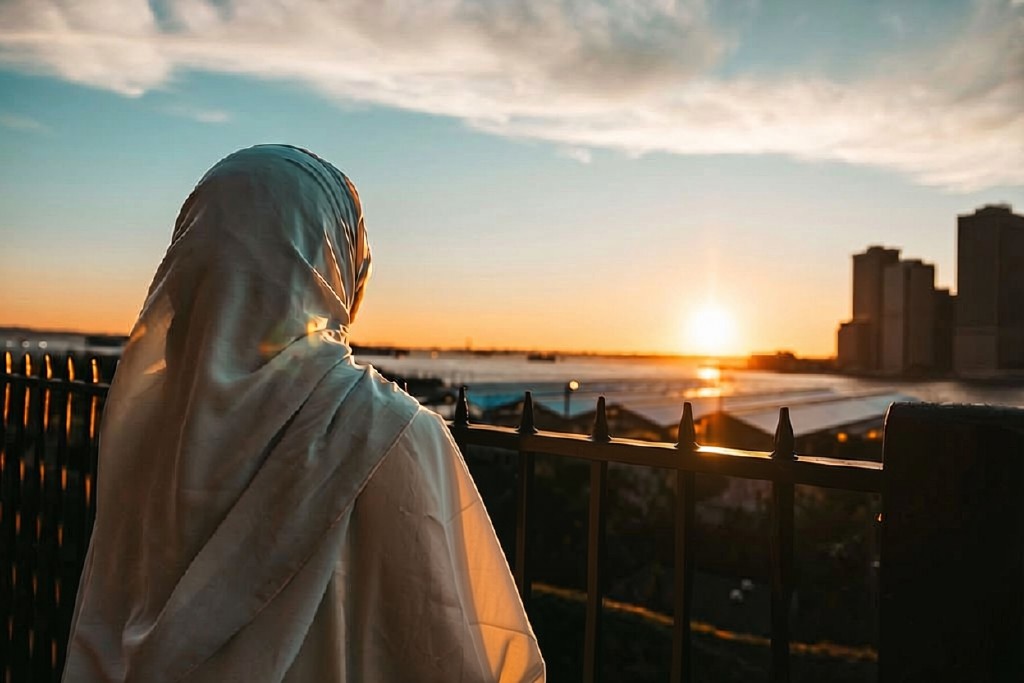 Young Woman Wearing Abaya Relaxing Looking to New York Downtown Cityscape. – Edited